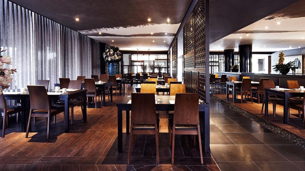 Kensington Jeju Hotel Bagian luar foto The interior of the restaurant